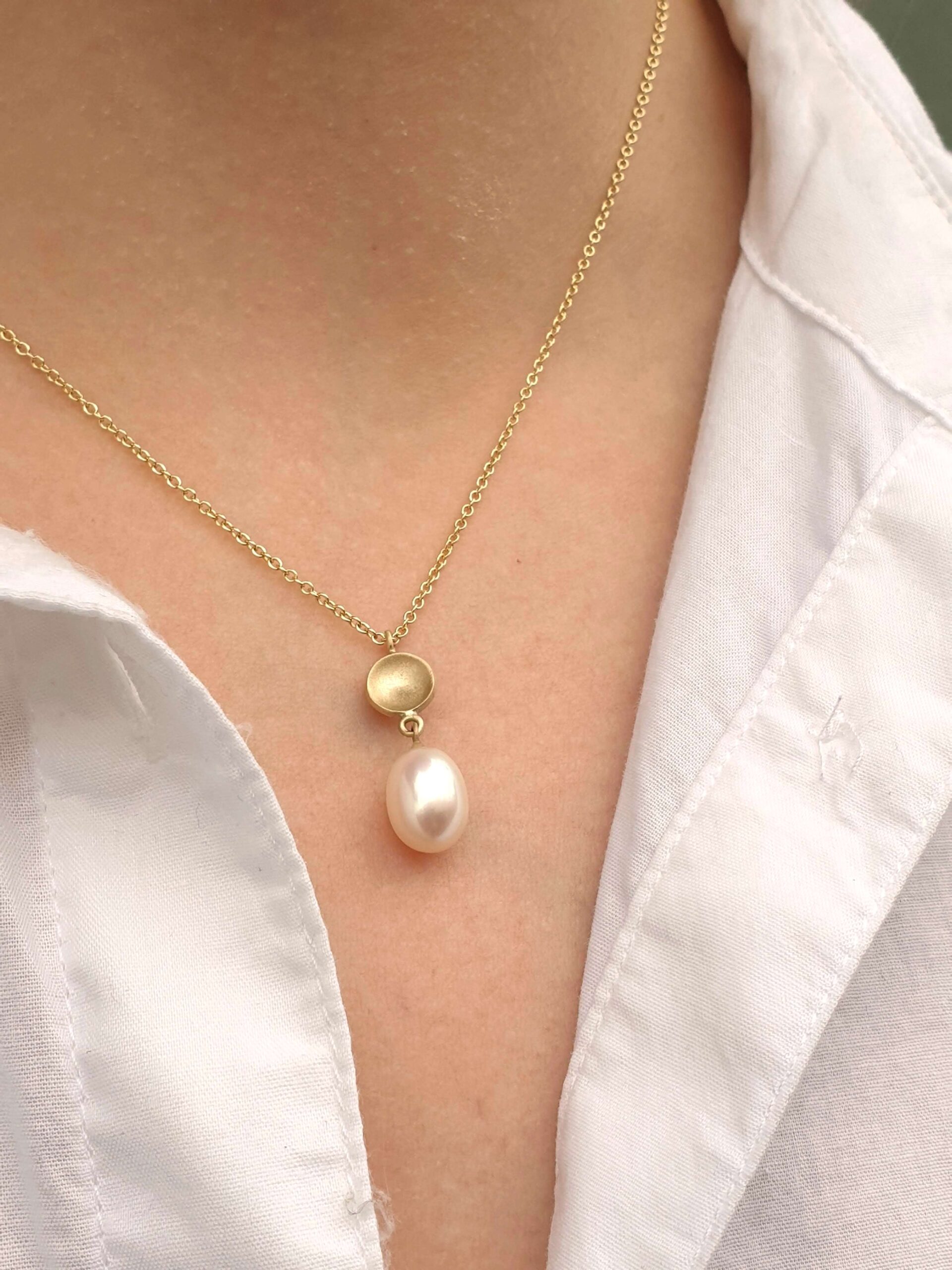 https://www.cliftonrocks.co.uk/wp-content/uploads/2022/10/Gold-Dome-Pearl-Drop-Necklace-Clifton-Rocks-Bristol-scaled-1.jpg