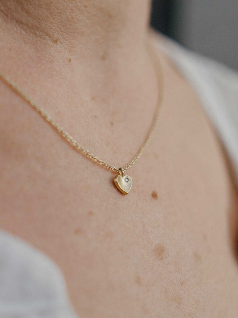 gold heart necklace with diamond