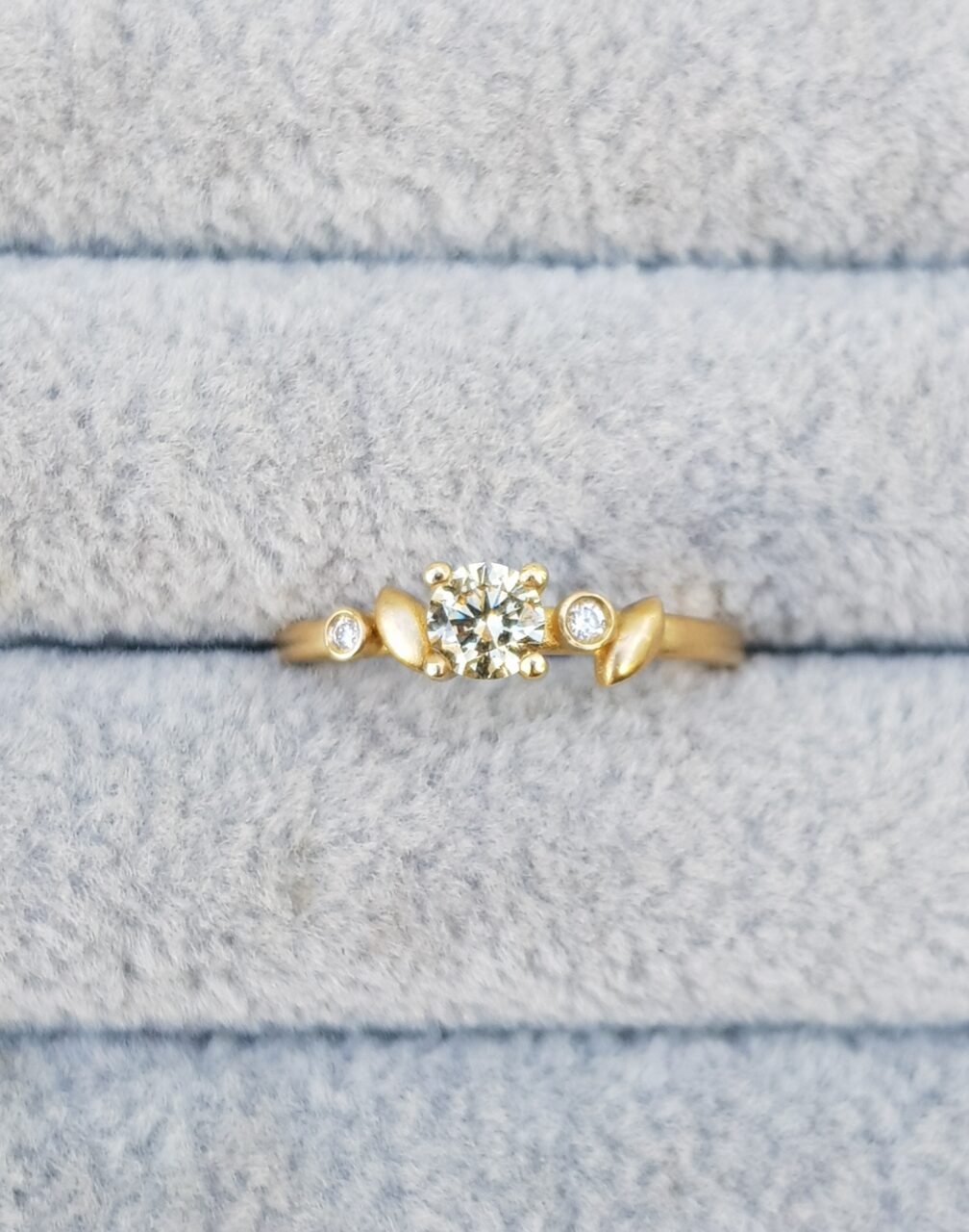 Yellow diamond ring with leaf details