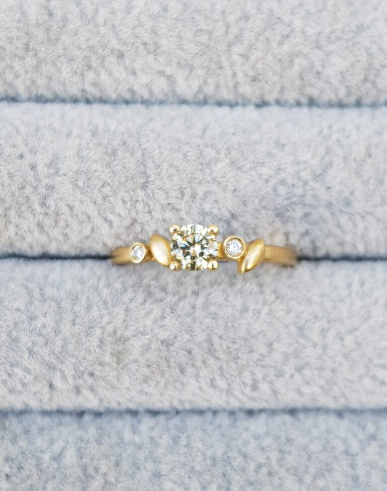 Yellow diamond ring with leaf details