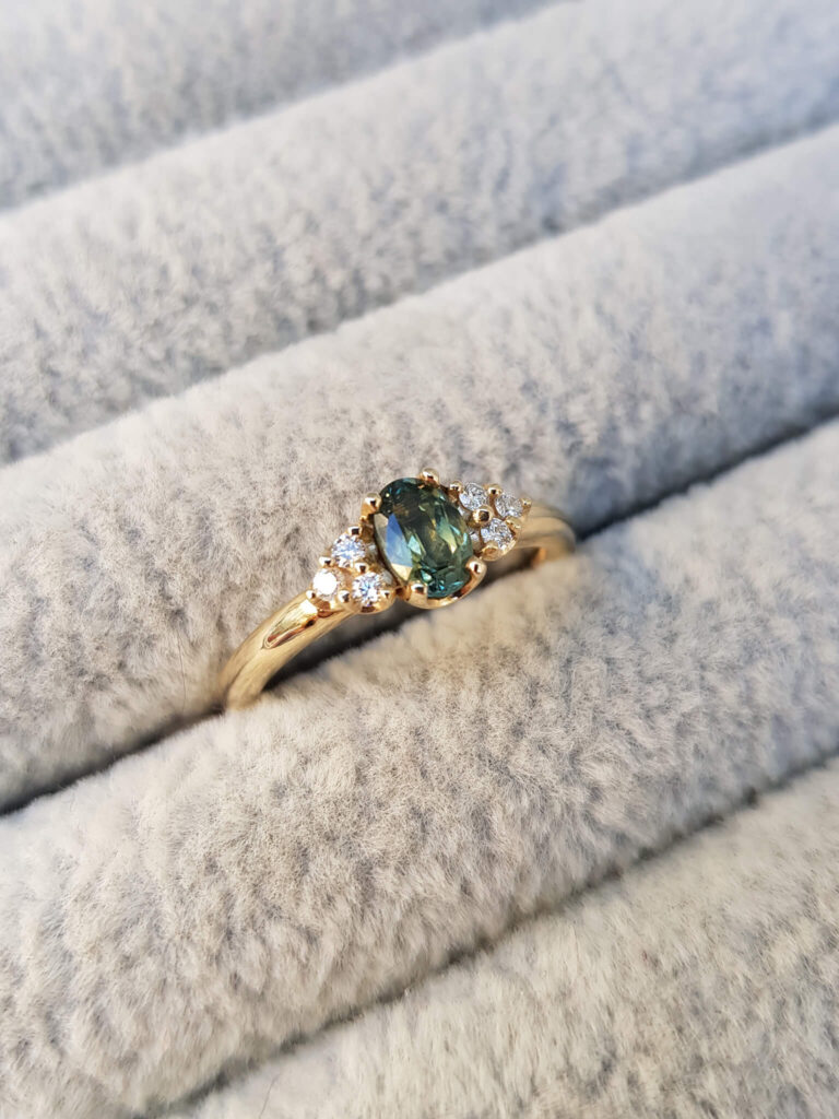 Teal Sapphire and Diamond Cluster Engagement Ring