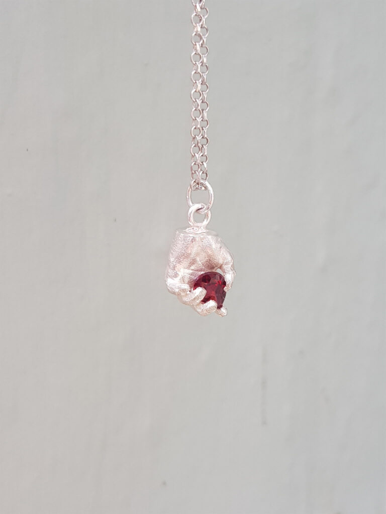 Silver and Garnet Hand Necklace