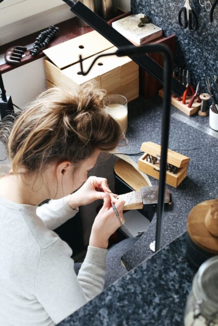 Dovile at her work bench