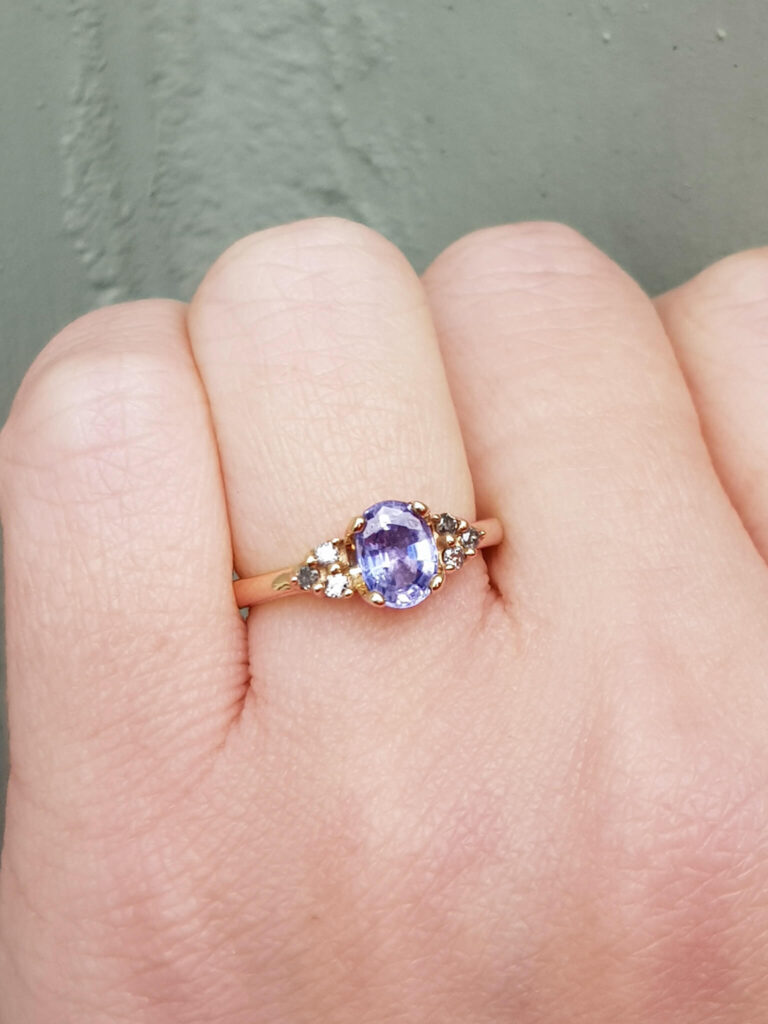 purple oval sapphire and diamond engagement ring