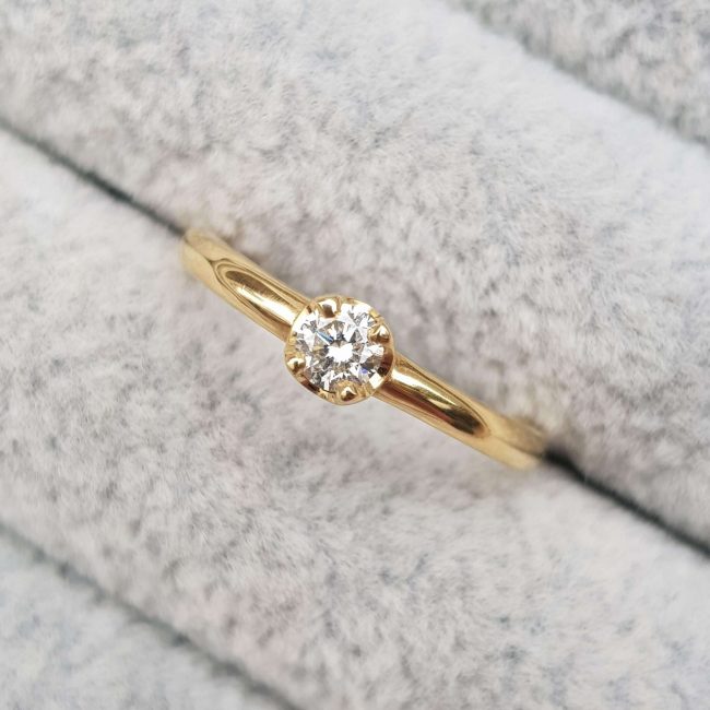 Gold and Diamond Solitaire Engagement Ring