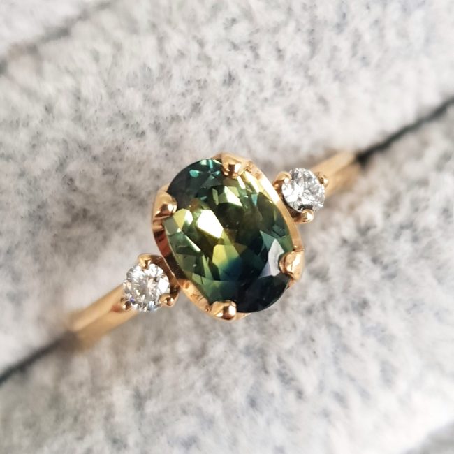 Oval Green Sapphire and Diamond Trilogy Engagement Ring