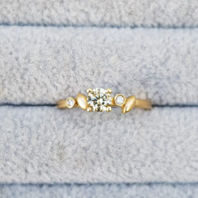 Yellow diamond ring with leaf details