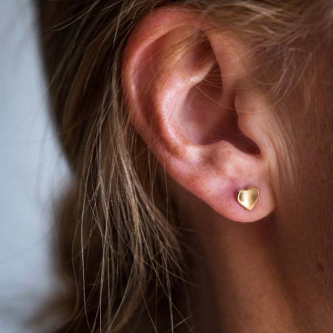 9ct-yellow-gold-heart-earring-body-closeup-scaled-1.jpg